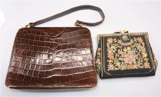 Tapestry and gilt-metal evening bag, fitted opera glasses, compact etc and a crocodile skin handbag